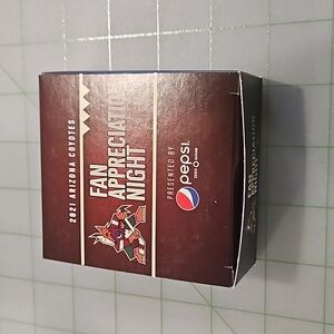 Coyotes hockey puck, certified signed by Roanta